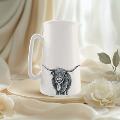 Charming illustration of a Highland Cow on a premium bone china jug, ideal for serving or displaying in any animal lover’s kitchen.


