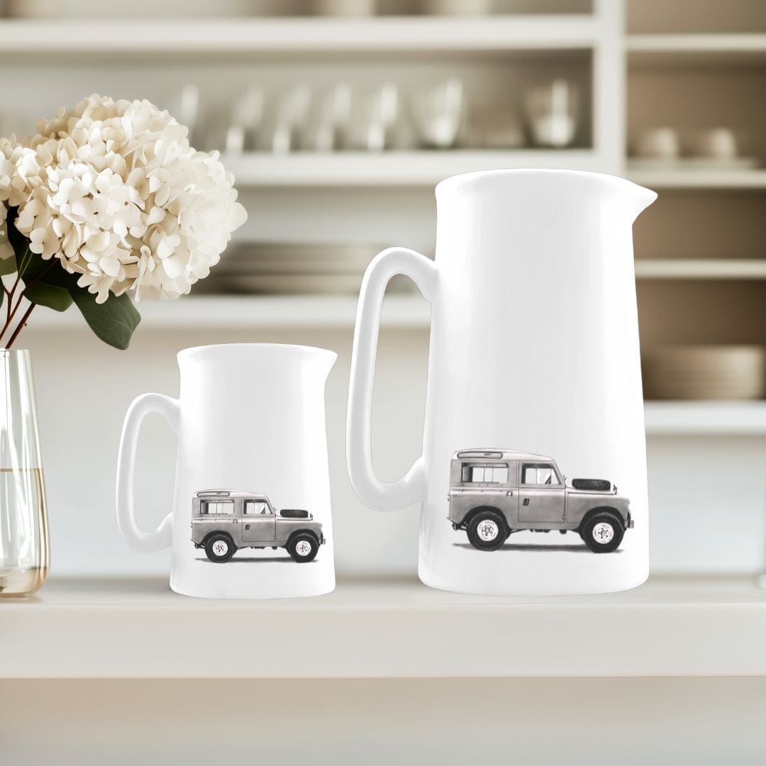 Pair of bone china jugs featuring a hand-drawn classic Land Rover, perfect for countryside kitchens and car enthusiasts.