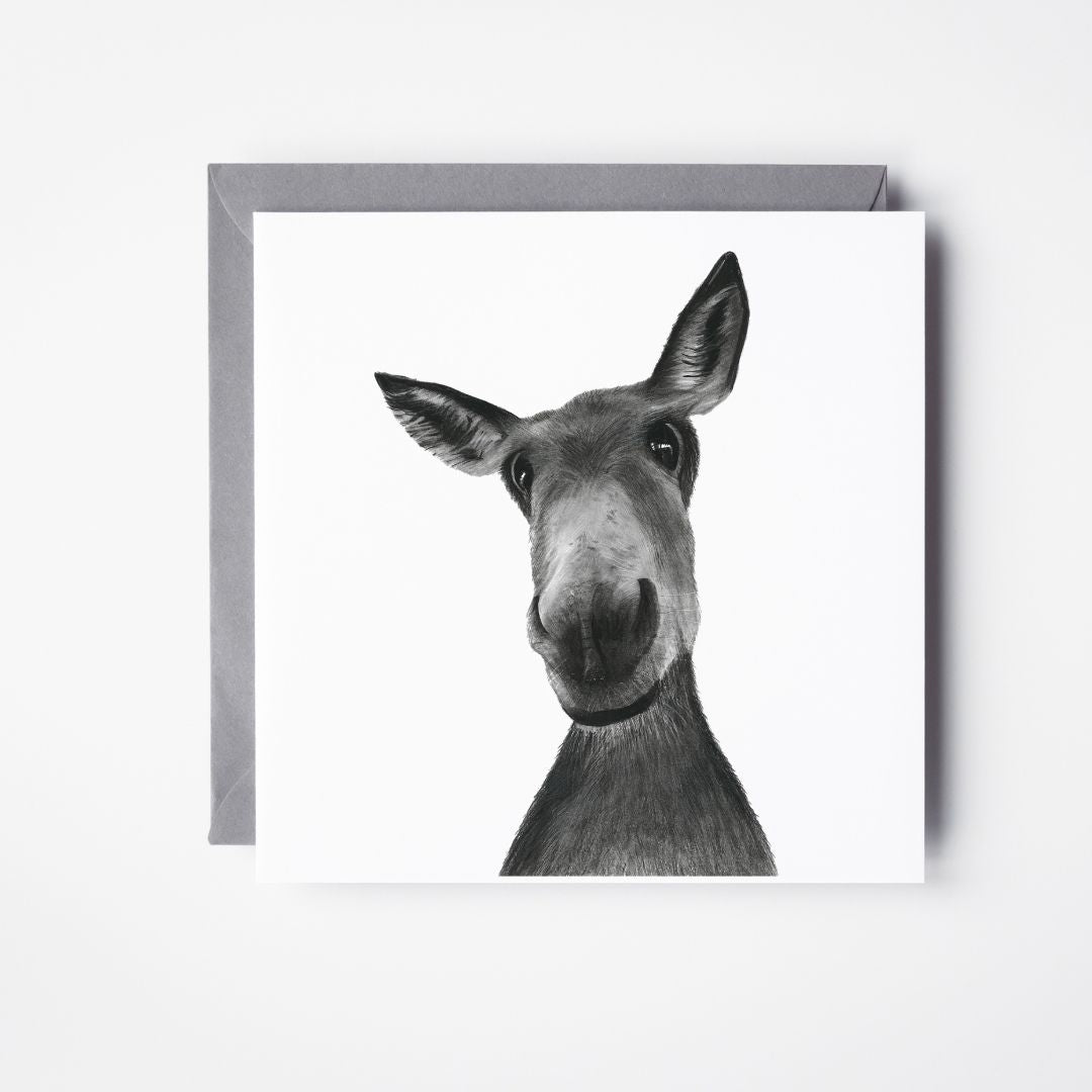 Hand-drawn Sirius the Donkey Greeting Card by Libra Fine Arts, showcasing a detailed black and white illustration of a donkey on premium cardstock. Ideal for animal lovers and countryside enthusiasts."







