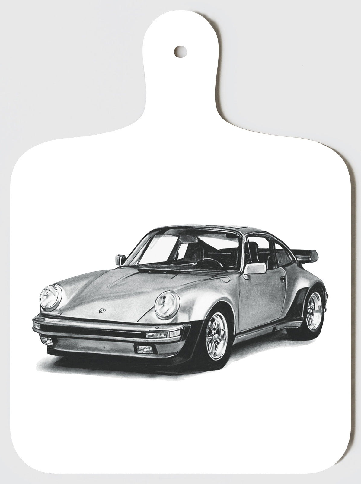 Compact and stylish mini chopping board featuring a sports car design, ideal for car lovers and adding a unique touch to your kitchen.