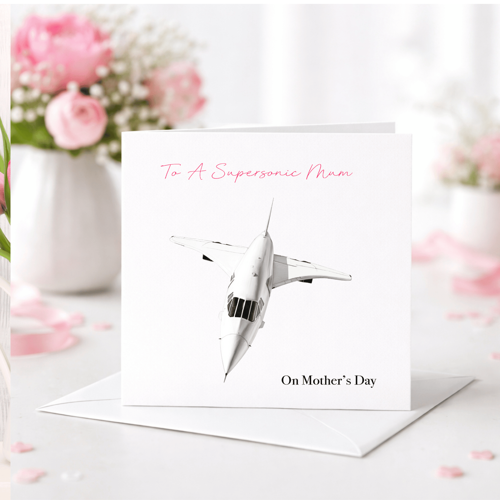 Greeting card with airplane illustration and text on a floral background