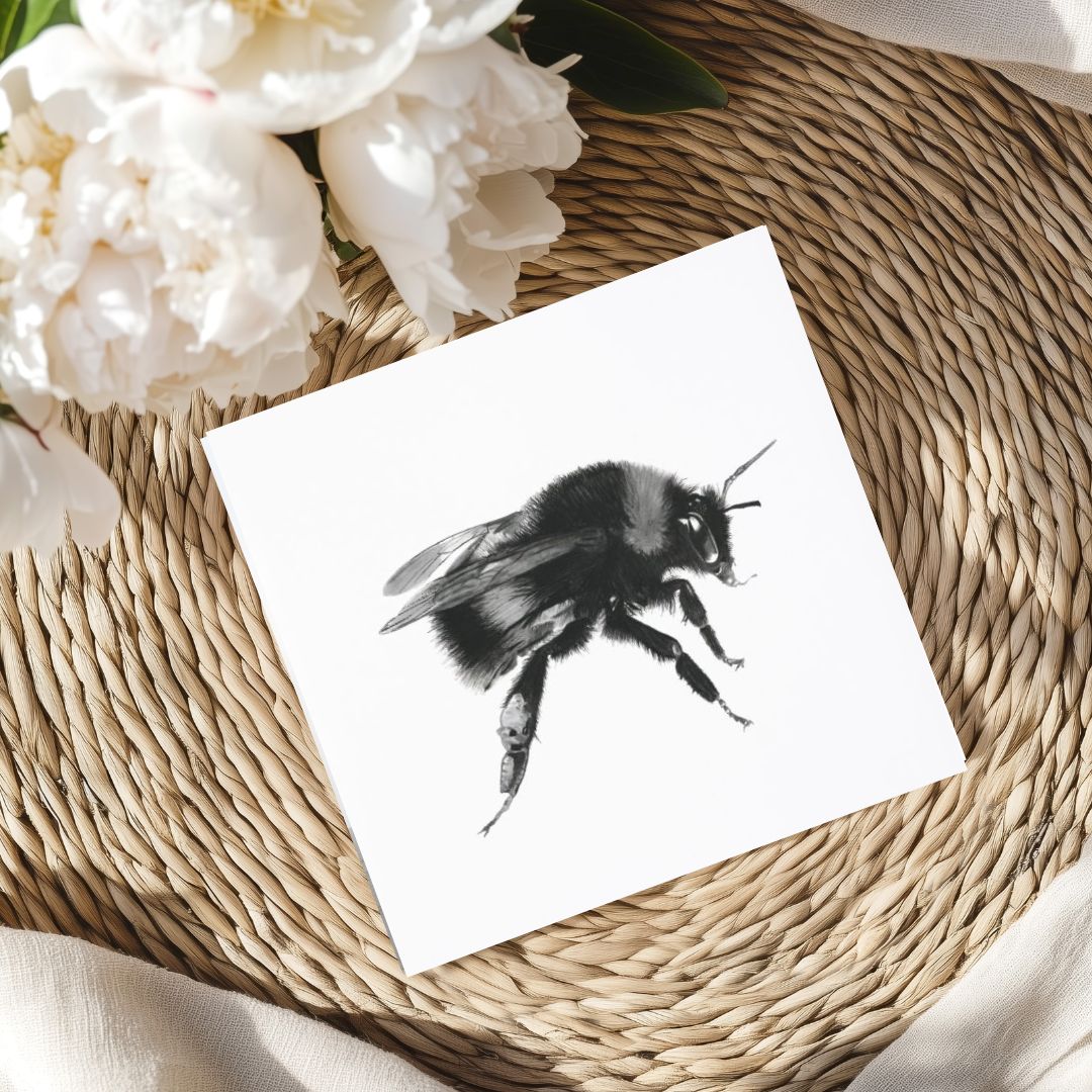 A handcrafted linocut greeting card featuring a white-tailed bumblebee, printed on recycled paper. Ideal for nature enthusiasts and supporters of eco-friendly products. Available on Etsy.