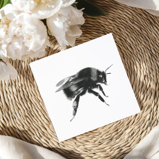 A handcrafted linocut greeting card featuring a white-tailed bumblebee, printed on recycled paper. Ideal for nature enthusiasts and supporters of eco-friendly products. Available on Etsy.