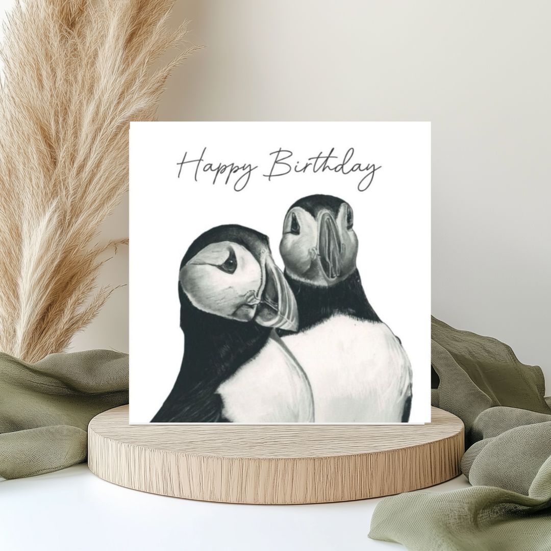 Puffins Birthday Card Hand-Drawn by Lobra Fine Arts – A charming, hand-drawn design featuring a pair of adorable puffins, perfect for sending joyful and cheerful birthday wishes to someone special.