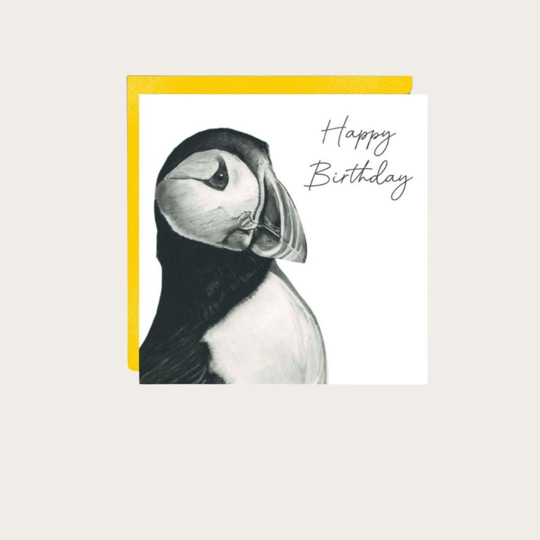 Celebrate a special birthday with our Happy Birthday Puffin Card. Featuring a delightful hand-drawn illustration of a playful puffin, this card is the perfect way to send cheerful birthday wishes. The whimsical design captures the charm and character of the puffin, making it an ideal choice for animal lovers or anyone who enjoys a fun, unique greeting. Printed on high-quality cardstock, this card is a joyful and memorable way to make someone's birthday extra specia