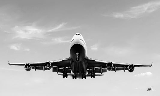 Monochrome Boeing 747 landing artwork with landing gear down