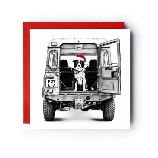 A border collie in a red Santa hat sitting in a Land Rover on a Christmas card with a red envelope