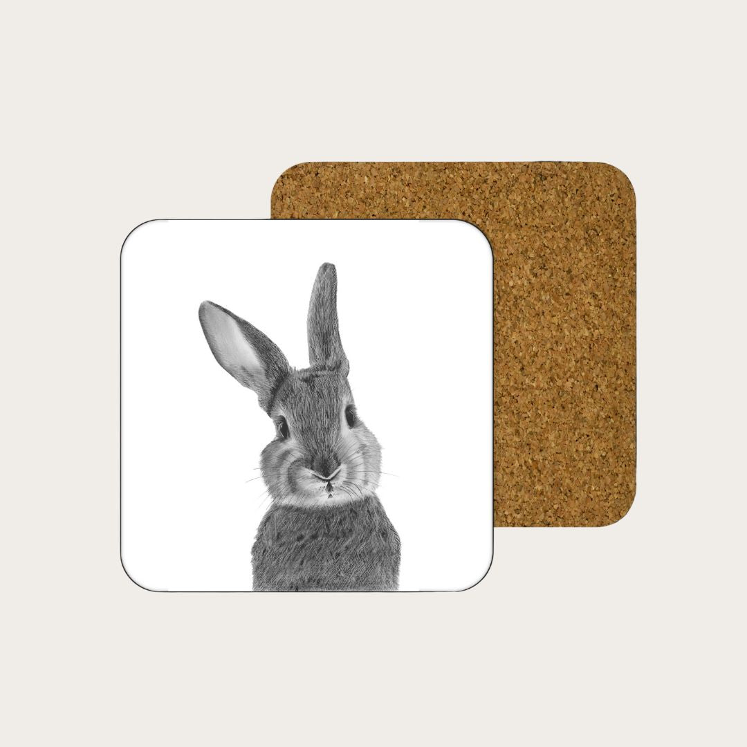 Hand-drawn bunny illustration on a drinks coaster by Libra Fine Arts. A delightful and detailed design, perfect for adding a touch of nature and charm to your home decor while protecting surfaces.
