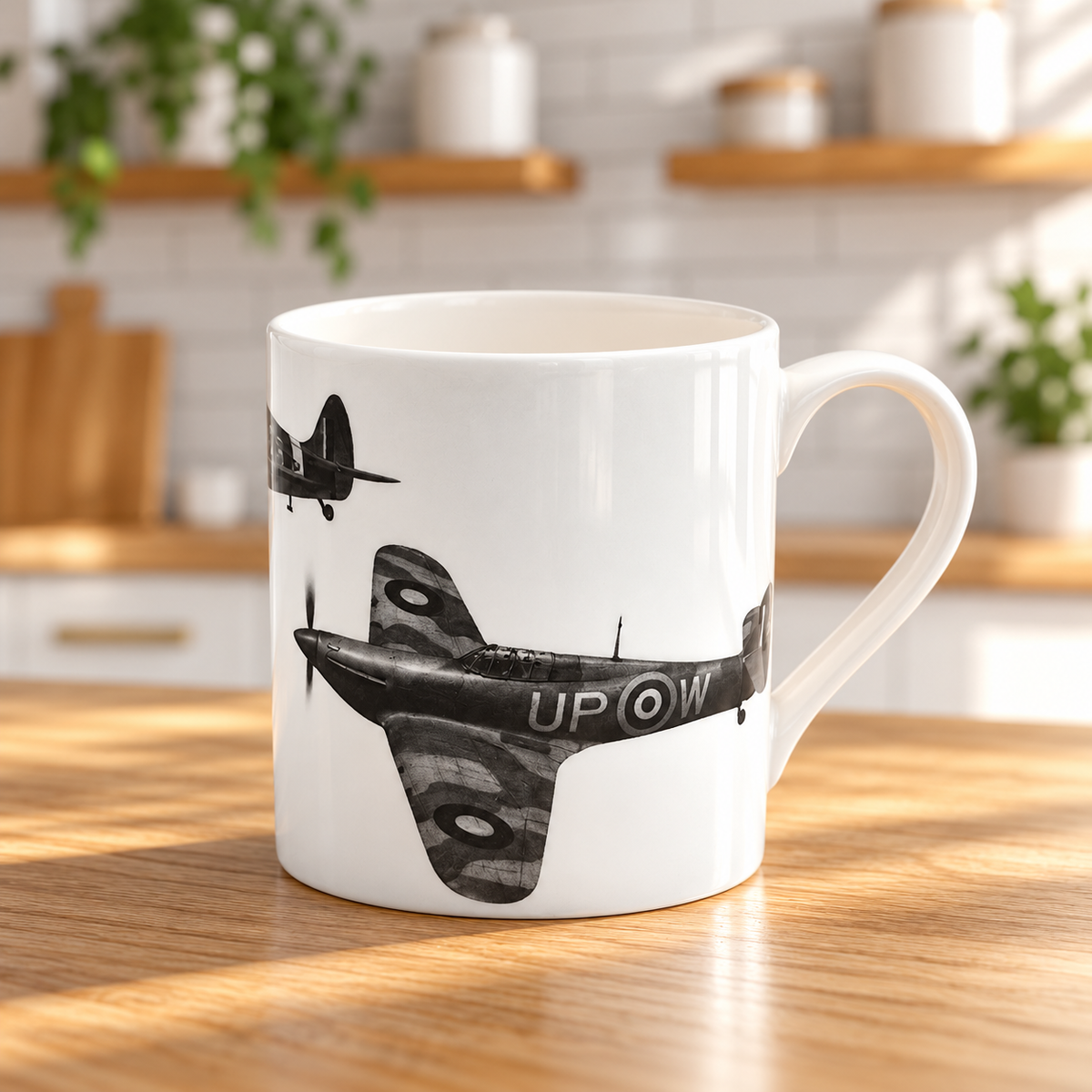 Battle of Britain fine bone china mug with hand-drawn aircraft artwork on an oak kitchen worktop
