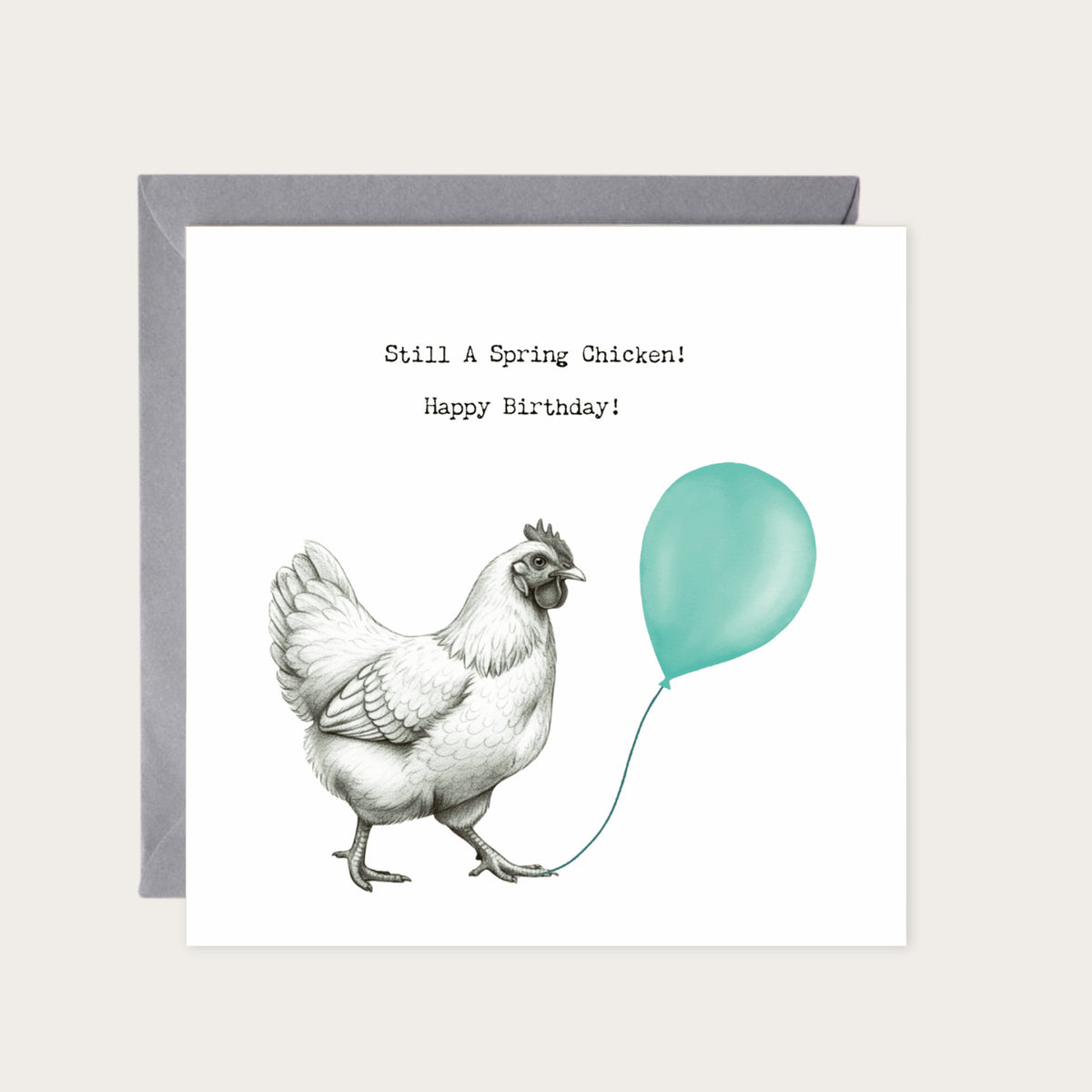 Still a Spring Chicken – Hand-Drawn Chicken Birthday Card with Balloon | Whimsical & Fun Art — card with grey envelope