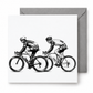 Road cyclists greeting card with a grey envelope on a white background