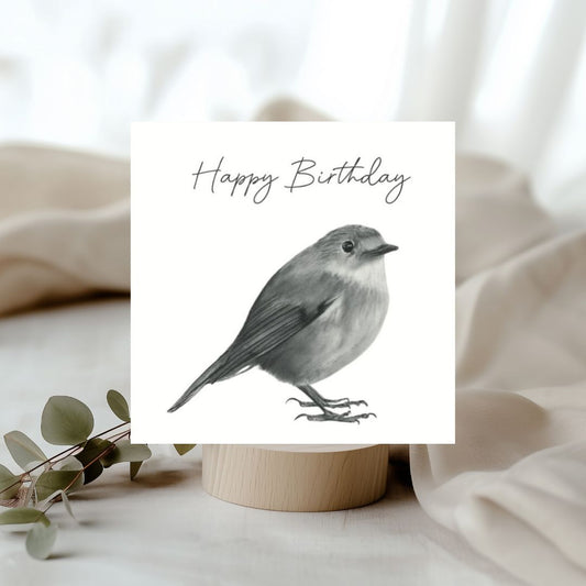 Hand-drawn birthday card featuring Atlas the robin perched on a branch, a beautiful nature-inspired design