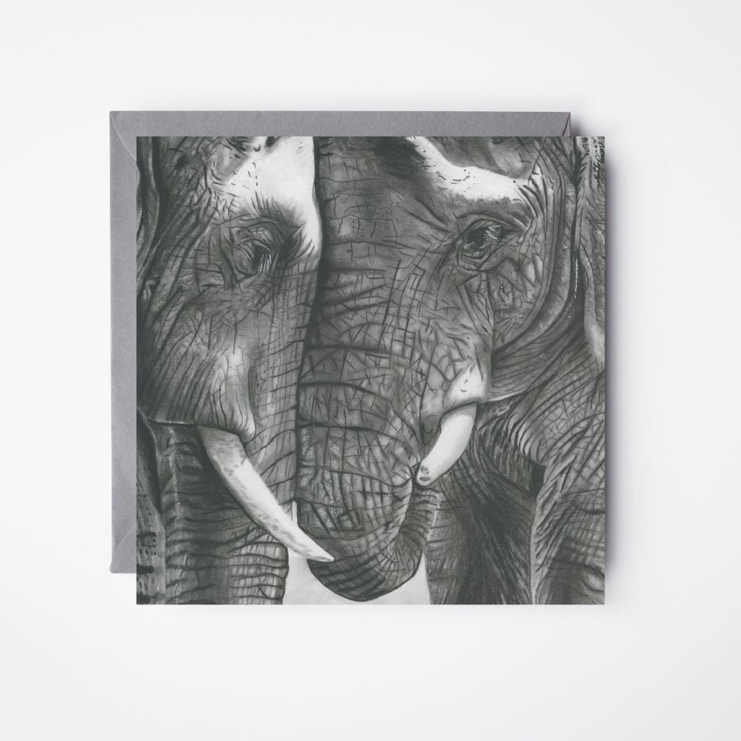 A Hand Drawn Elephant Tenderness Greeting Card From Libra Fine Arts, featuring a beautifully detailed illustration of a mother elephant and her calf, accompanied by a grey envelope.